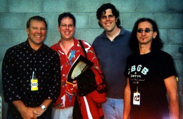Rush concert. (L to R) Alex Lifeson, David Gordon, Tom Gordon, Geddy Lee. Concord Pavillion, Concord, California, July 12, 2004.